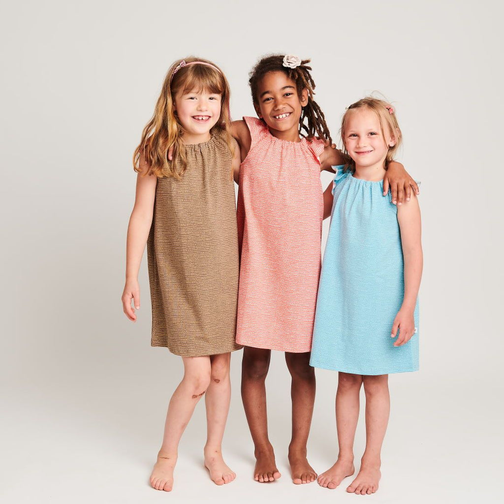 Organic a-line dress "Dotted Lines Coral" made from 95% organic cotton and 5% elastane