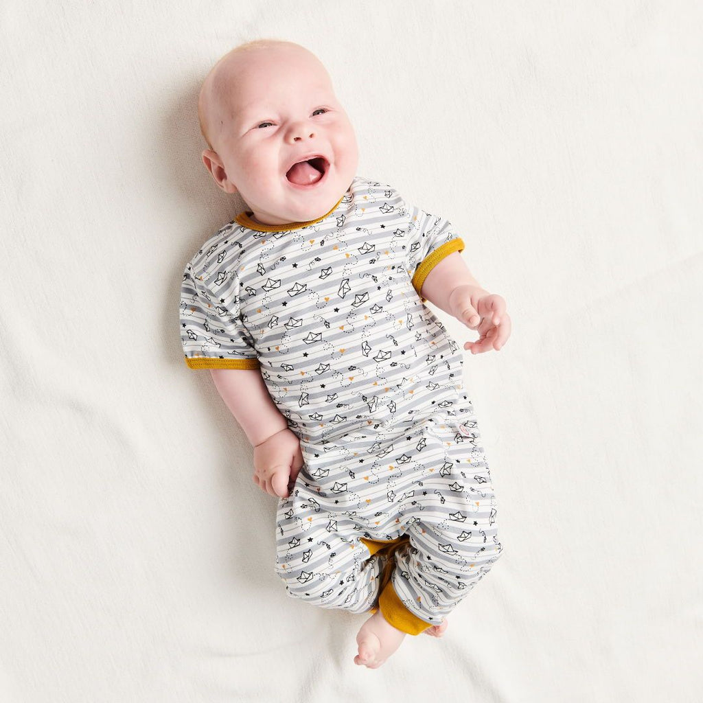 Organic shortsleeved romper "My little golden Ship" made from 95% organic cotton and 5% elastane